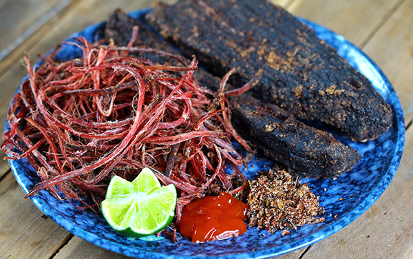 Buffalo meat drying on fire